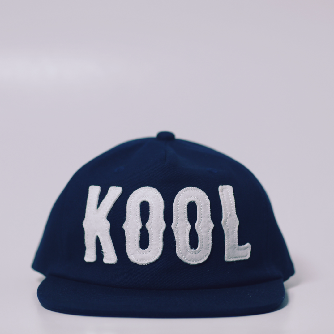 “KOOL” SPELLOUT 5 PANEL CAP